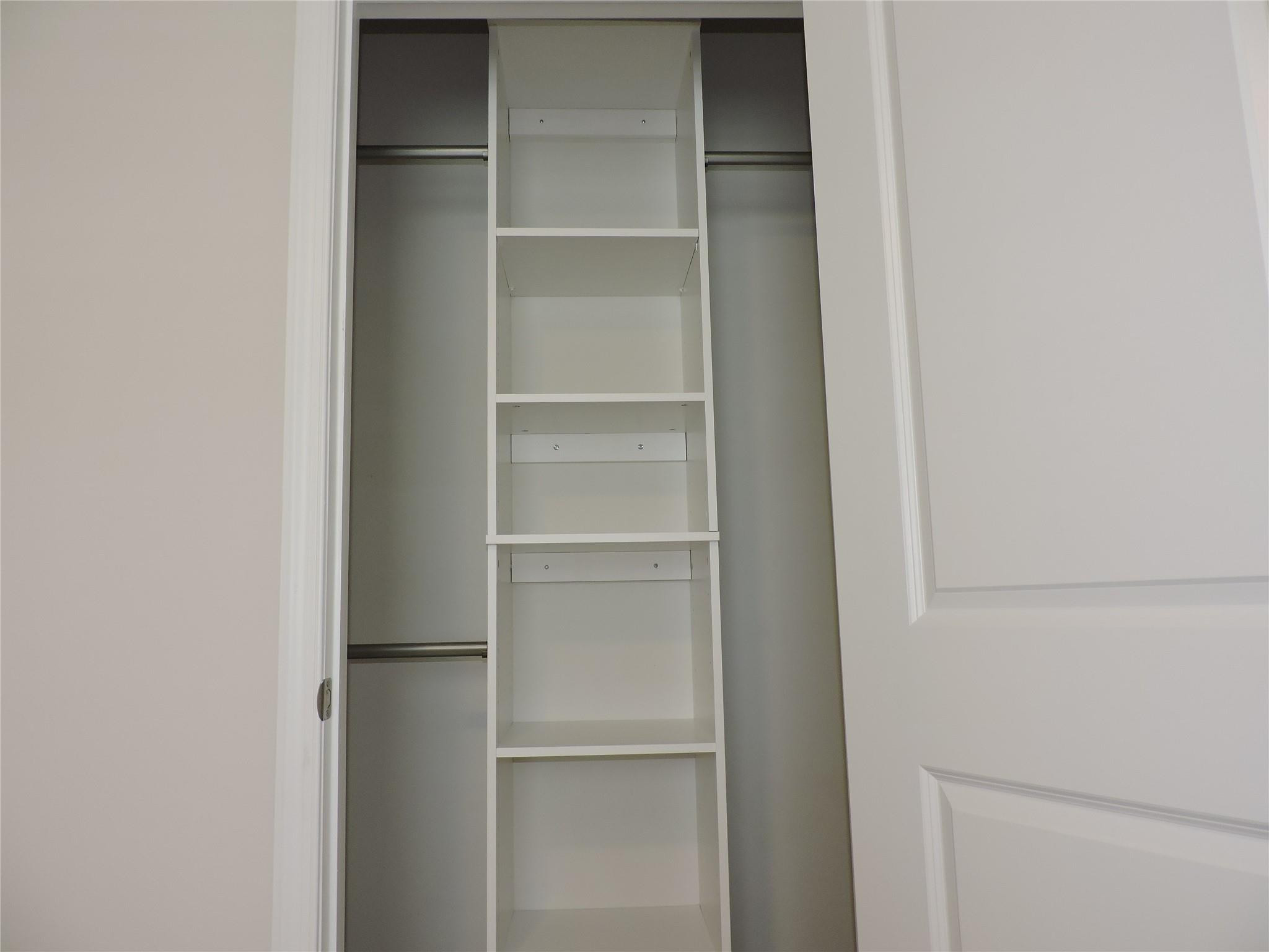 836 Persimmon Place Fort Pierce, FL 34981 - Photo 42 of 78 BEDROOM #2 CLOSET WITH BUILTIN STORAGE