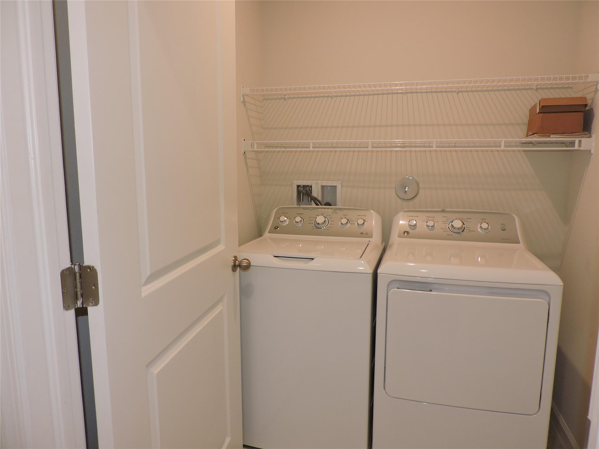 836 Persimmon Place Fort Pierce, FL 34981 - Photo 52 of 78 LAUNDRY ROOM WITH STORAGE SHELVES