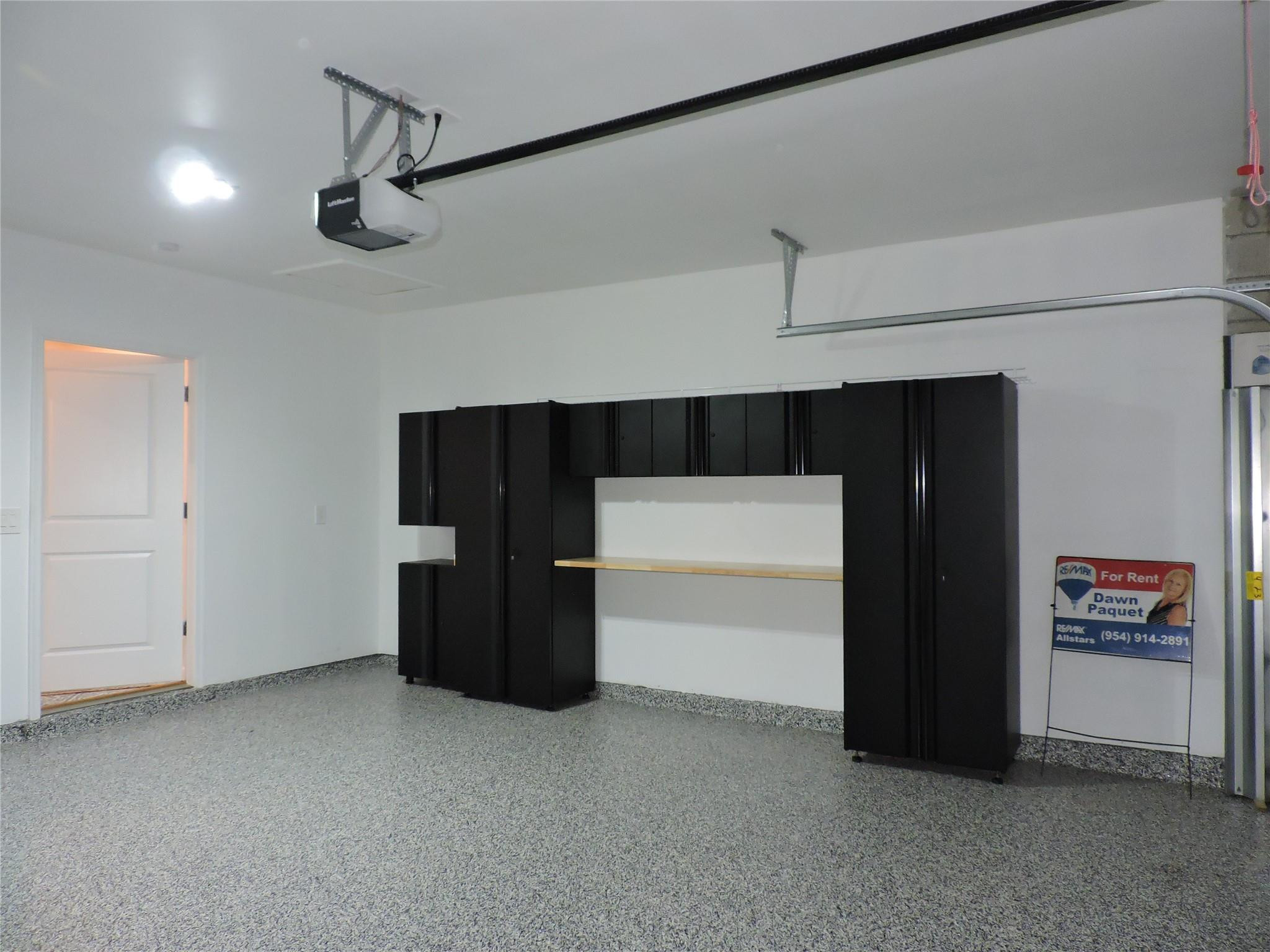 836 Persimmon Place Fort Pierce, FL 34981 - Photo 62 of 78 2 CAR GARAGE WITH HUSKY STORAGE SYSTEM