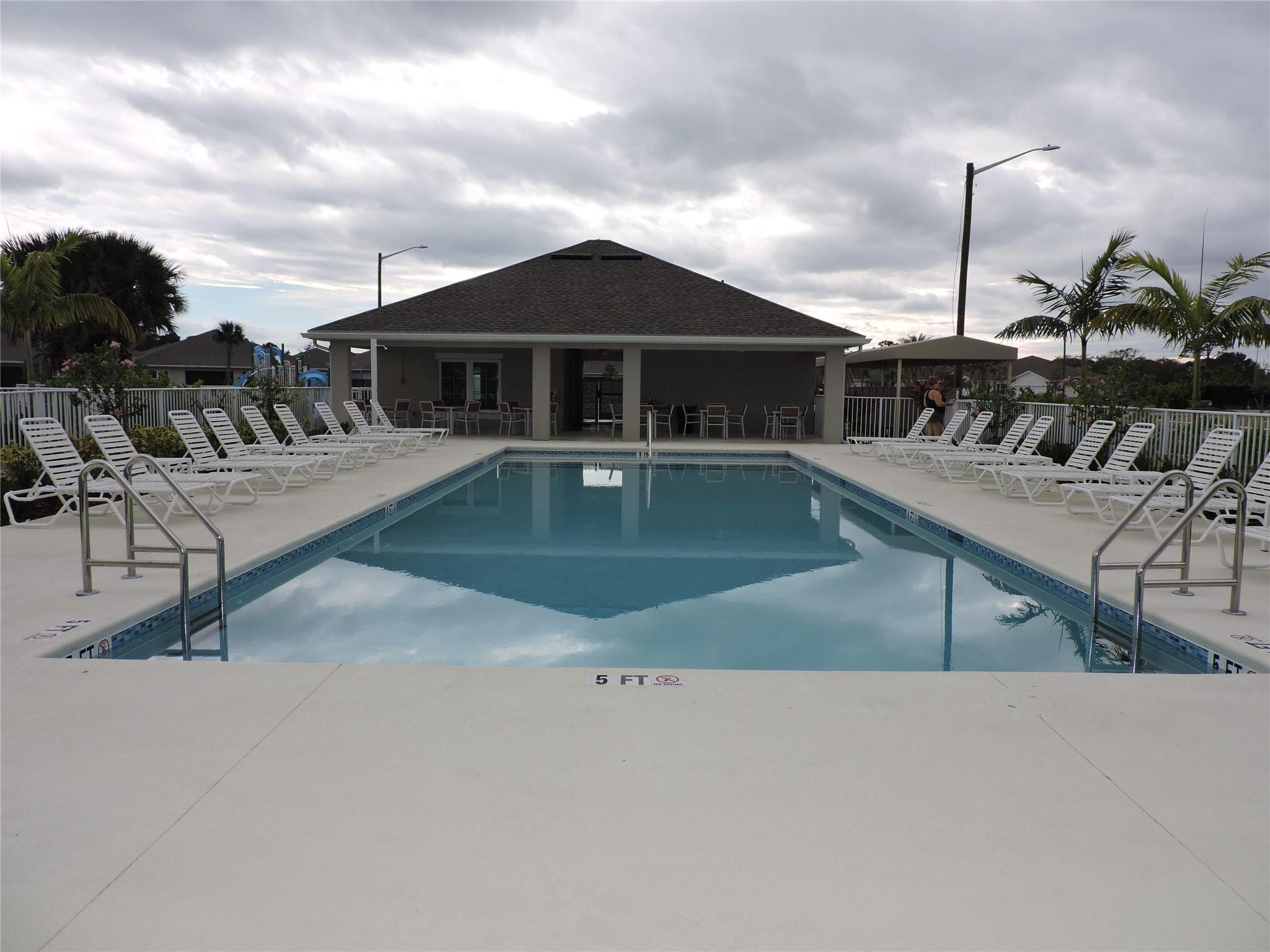 836 Persimmon Place Fort Pierce, FL 34981 - Photo 73 of 78 COMMUNITY SWIMMING POOL & CLUBHOUSE