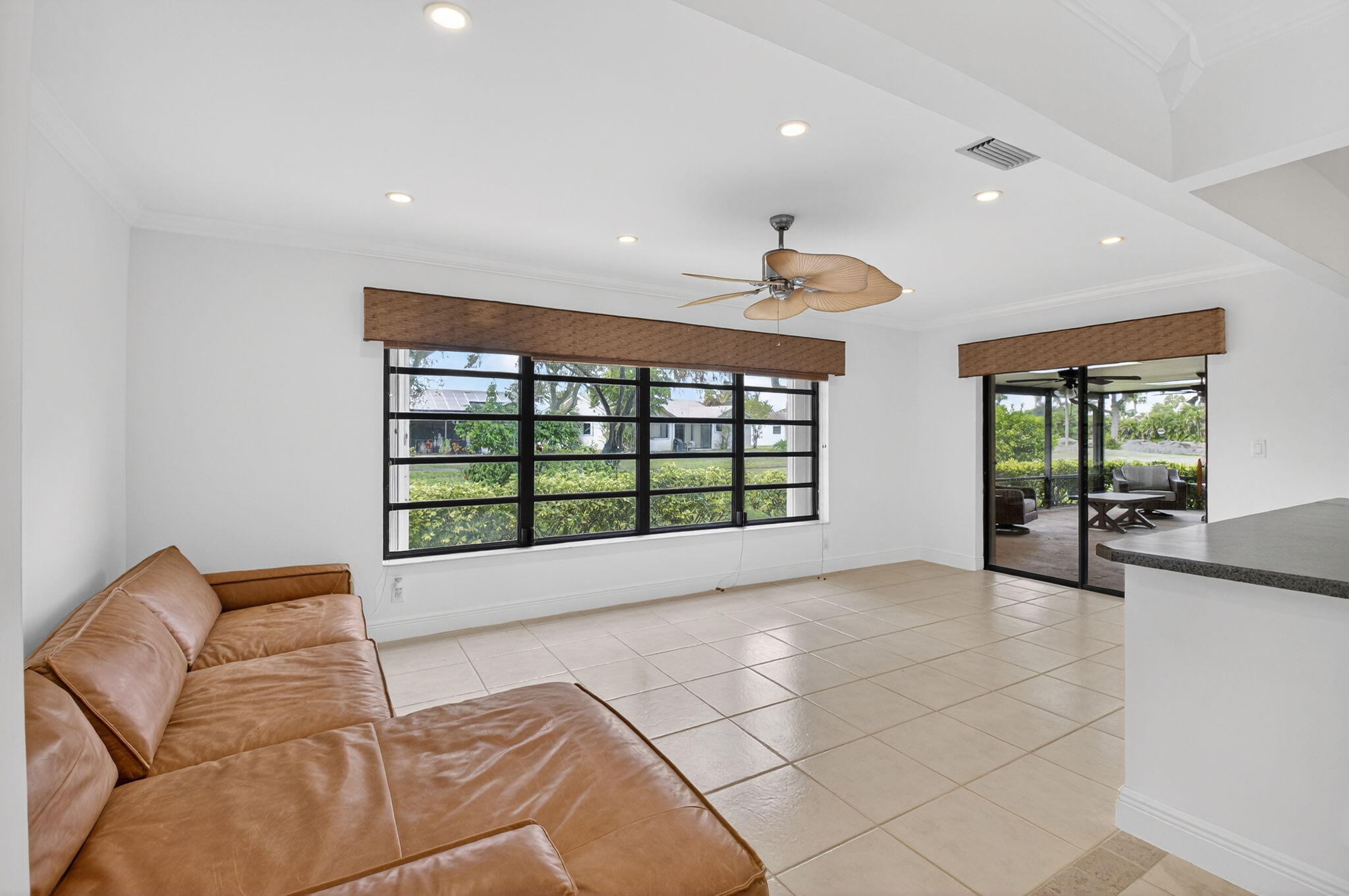 18051 104th Terrace South Boca Raton, FL 33498 - Photo 11 of 46 a living room with furniture and large windows