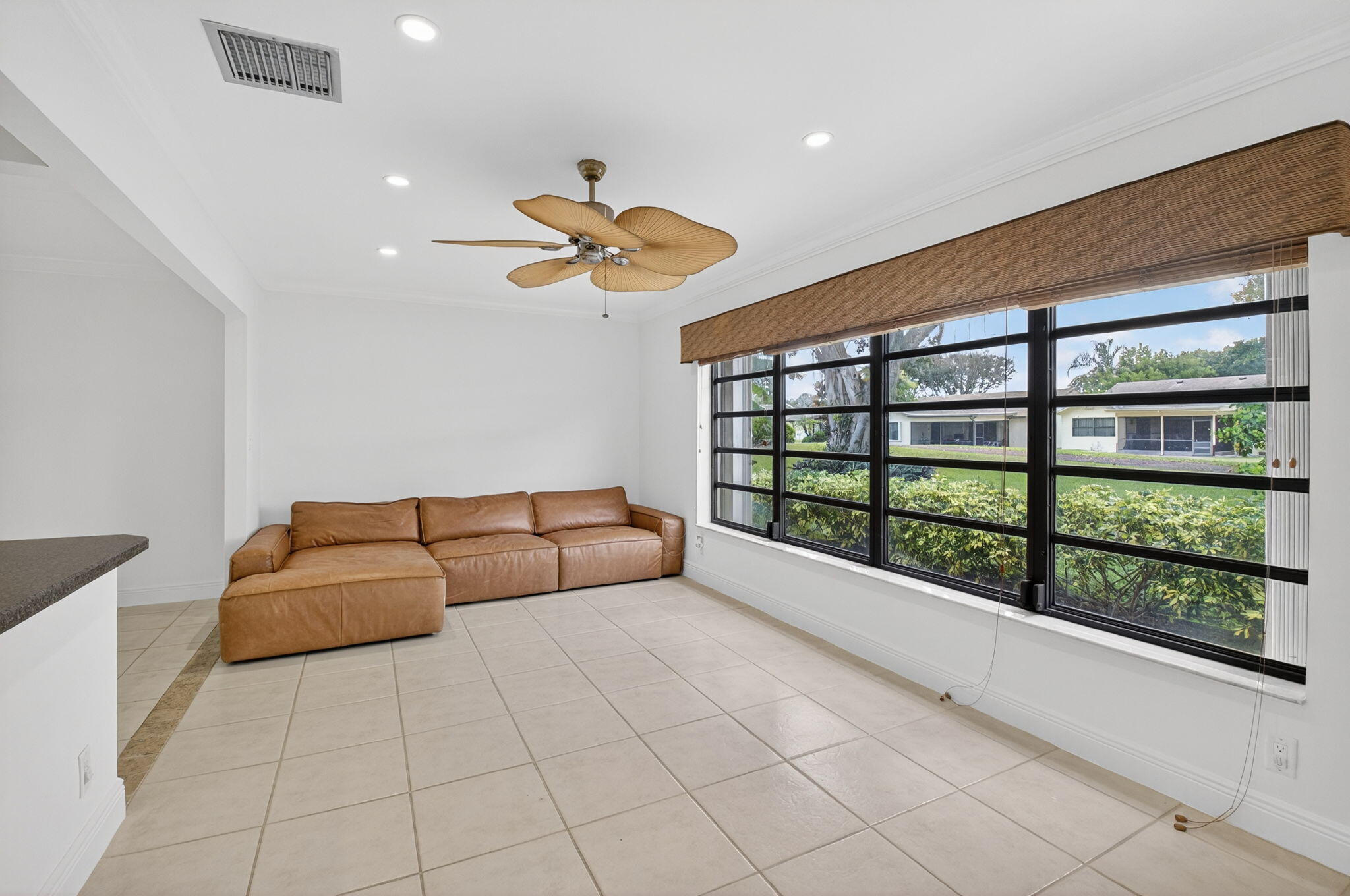 18051 104th Terrace South Boca Raton, FL 33498 - Photo 12 of 46 a living room with furniture and a large window