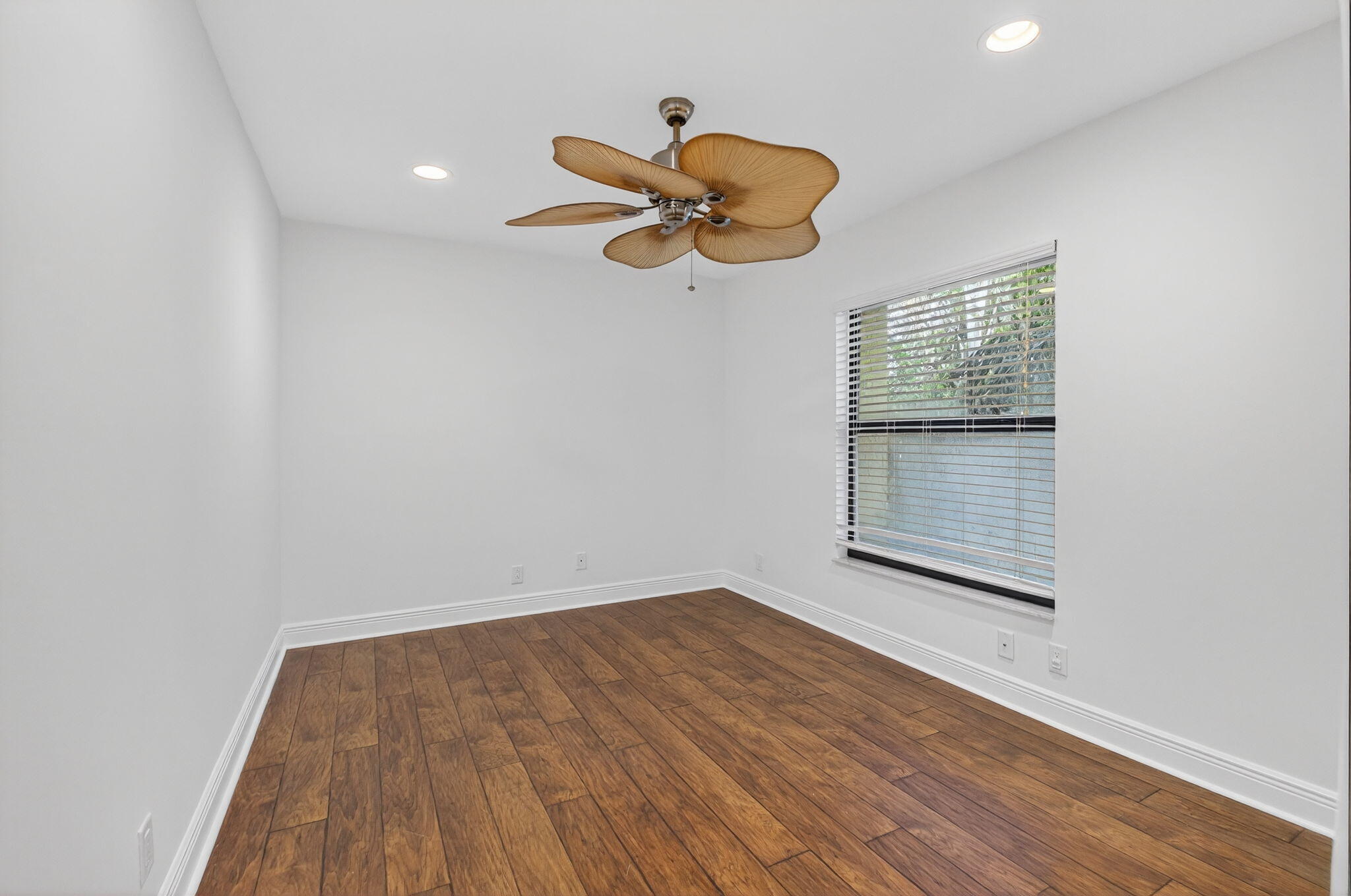 18051 104th Terrace South Boca Raton, FL 33498 - Photo 23 of 46 a view of room with hardwood floor and ceiling fan