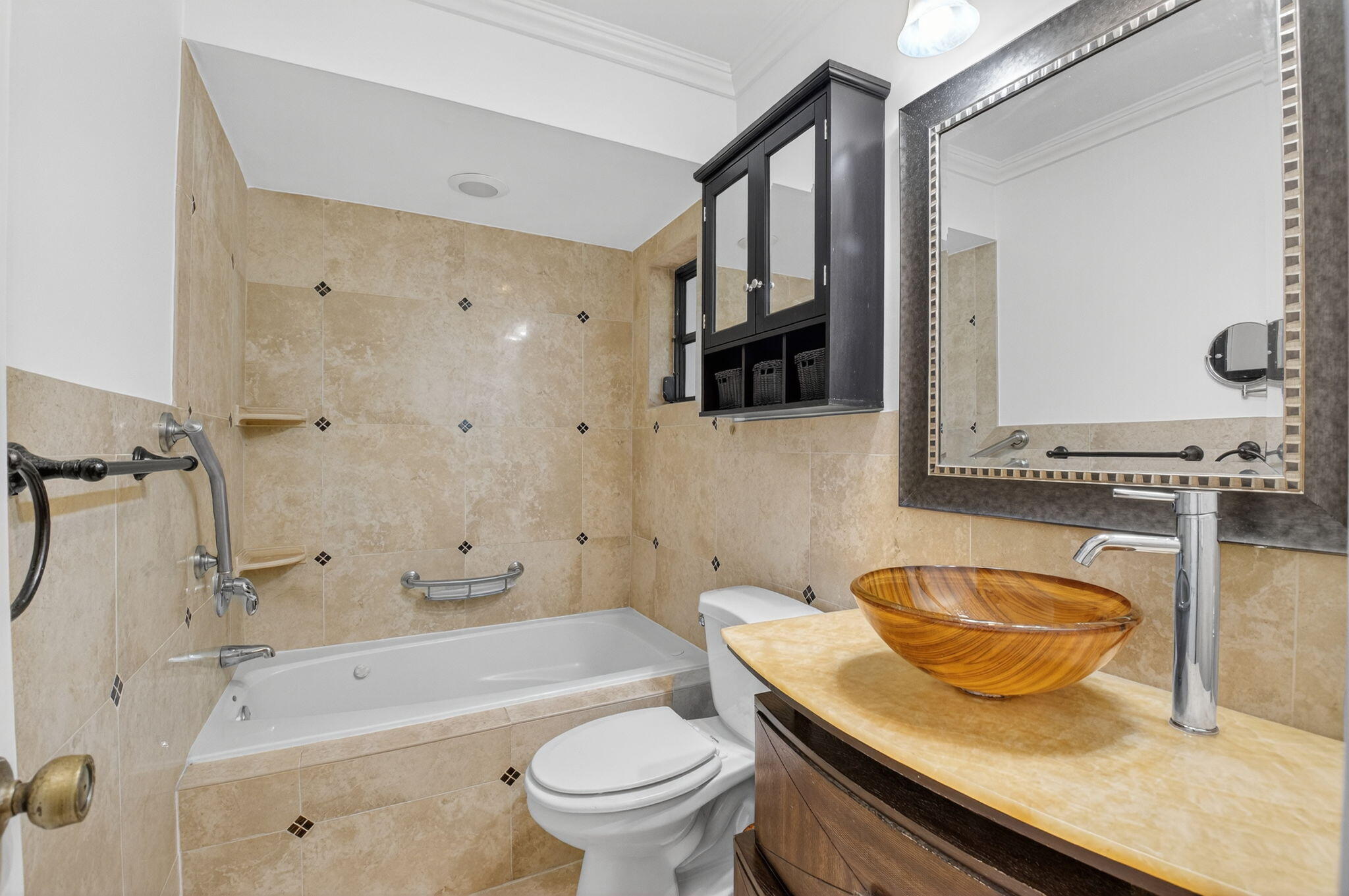 18051 104th Terrace South Boca Raton, FL 33498 - Photo 29 of 46 a bathroom with a granite countertop sink a mirror a toilet and bathtub