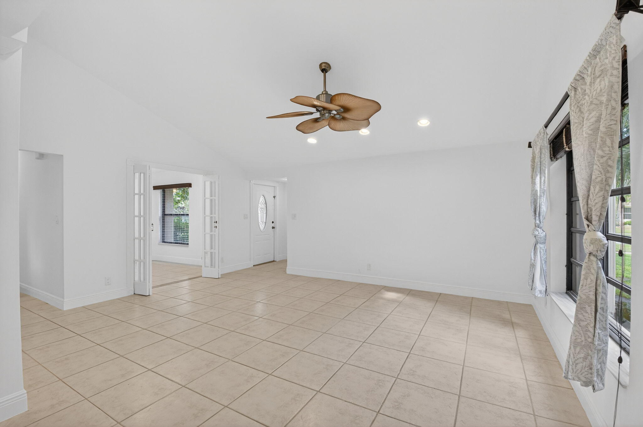 18051 104th Terrace South Boca Raton, FL 33498 - Photo 3 of 46 wooden floor in an empty room with a window