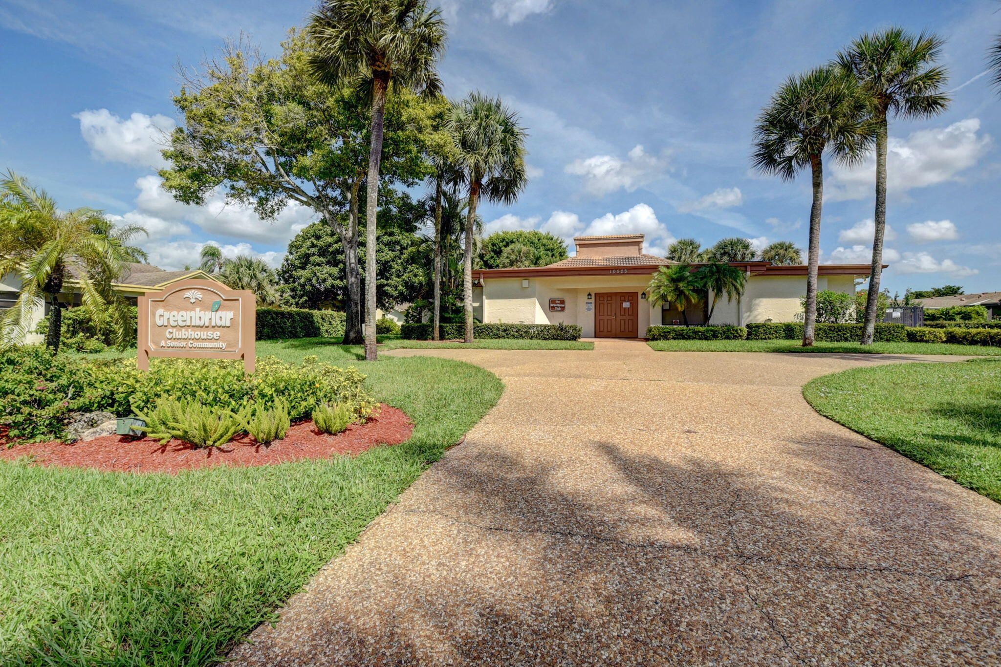 18051 104th Terrace South Boca Raton, FL 33498 - Photo 37 of 46 front view of a house with a yard and potted plants