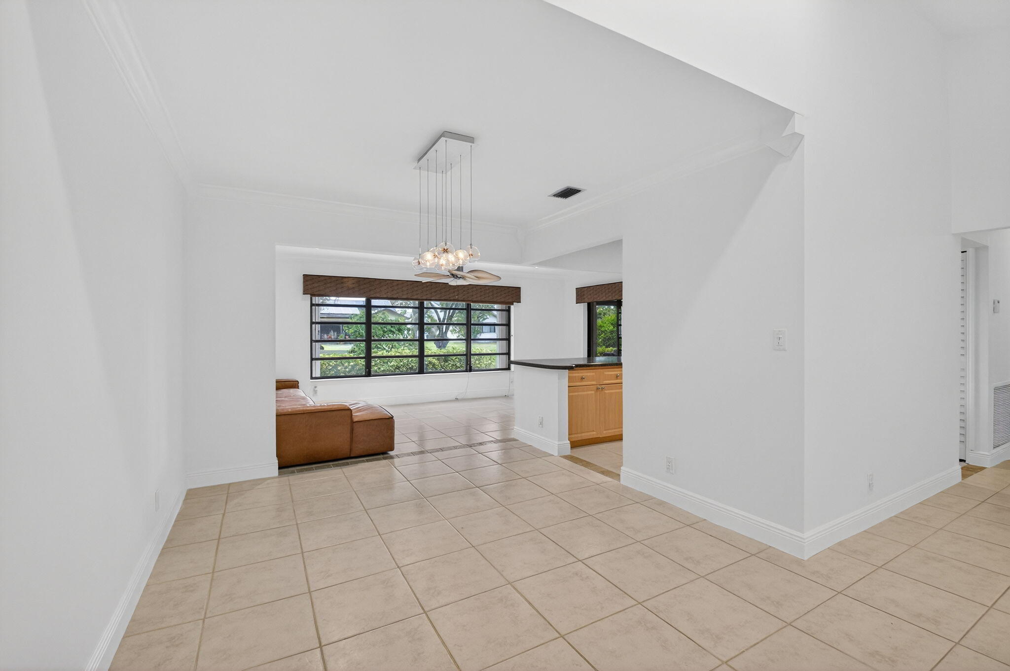 18051 104th Terrace South Boca Raton, FL 33498 - Photo 9 of 46 a view of workspace with furniture and a window