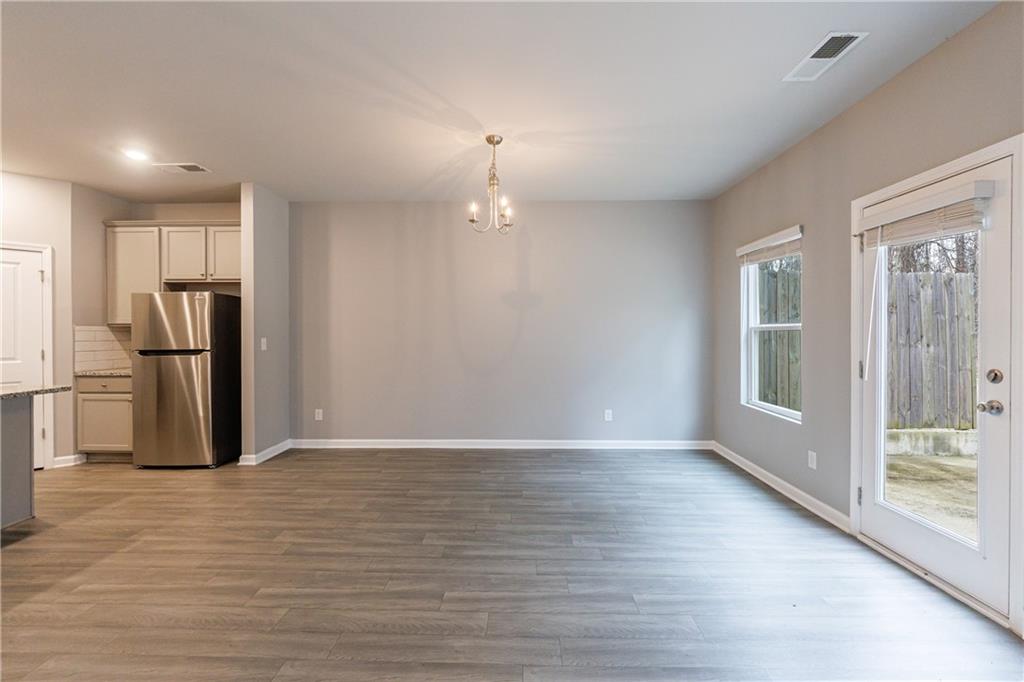 3413 Endurance Court Atlanta, GA 30349 - Photo 26 of 44 a view of an empty room with a window