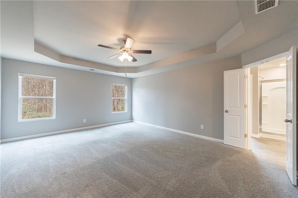 3413 Endurance Court Atlanta, GA 30349 - Photo 28 of 44 a view of an empty room with a window