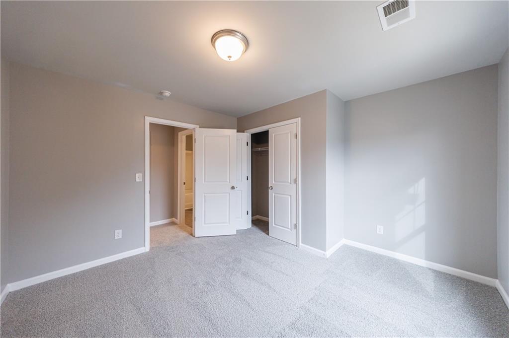3413 Endurance Court Atlanta, GA 30349 - Photo 43 of 44 a view of an empty room
