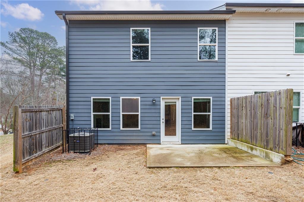 3413 Endurance Court Atlanta, GA 30349 - Photo 5 of 44 a view of a house with a door and chair