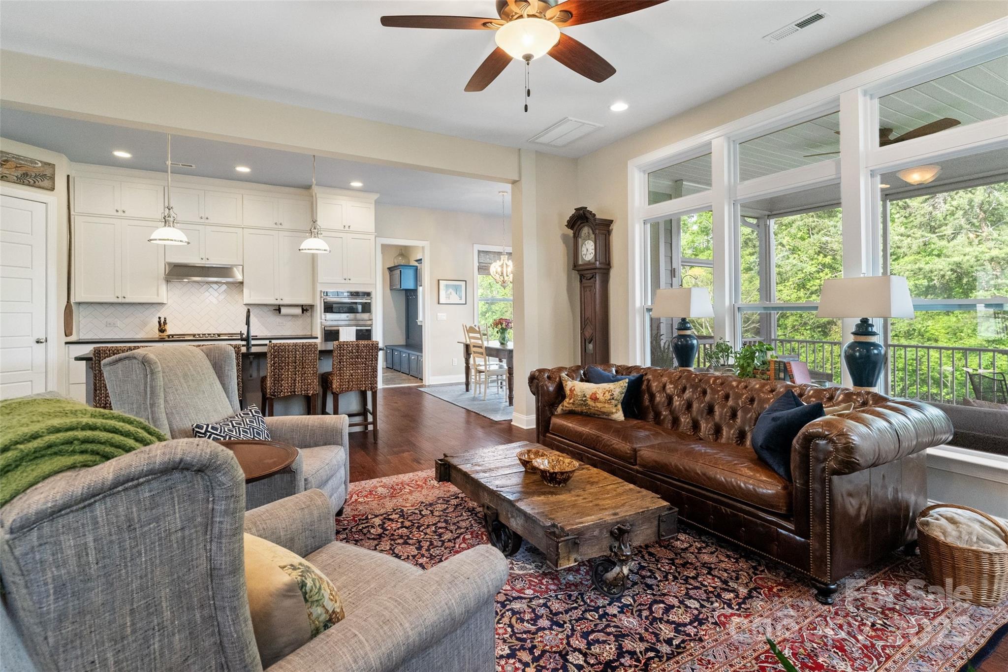 5301 Meadowcroft Way Fort Mill, SC 29708 - Photo 22 of 48 a living room with furniture ceiling fan and a large window