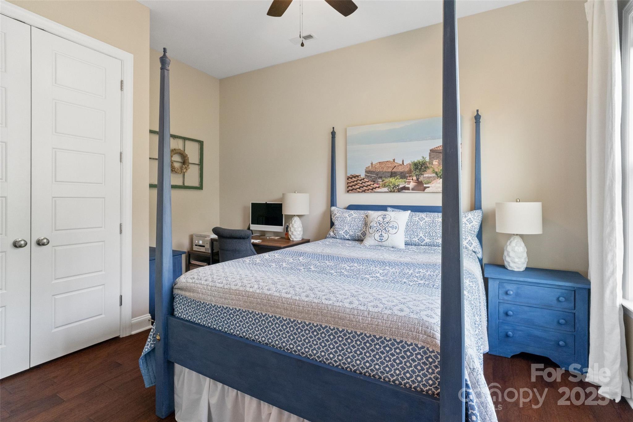 5301 Meadowcroft Way Fort Mill, SC 29708 - Photo 25 of 48 a bedroom with a bed and wooden floor