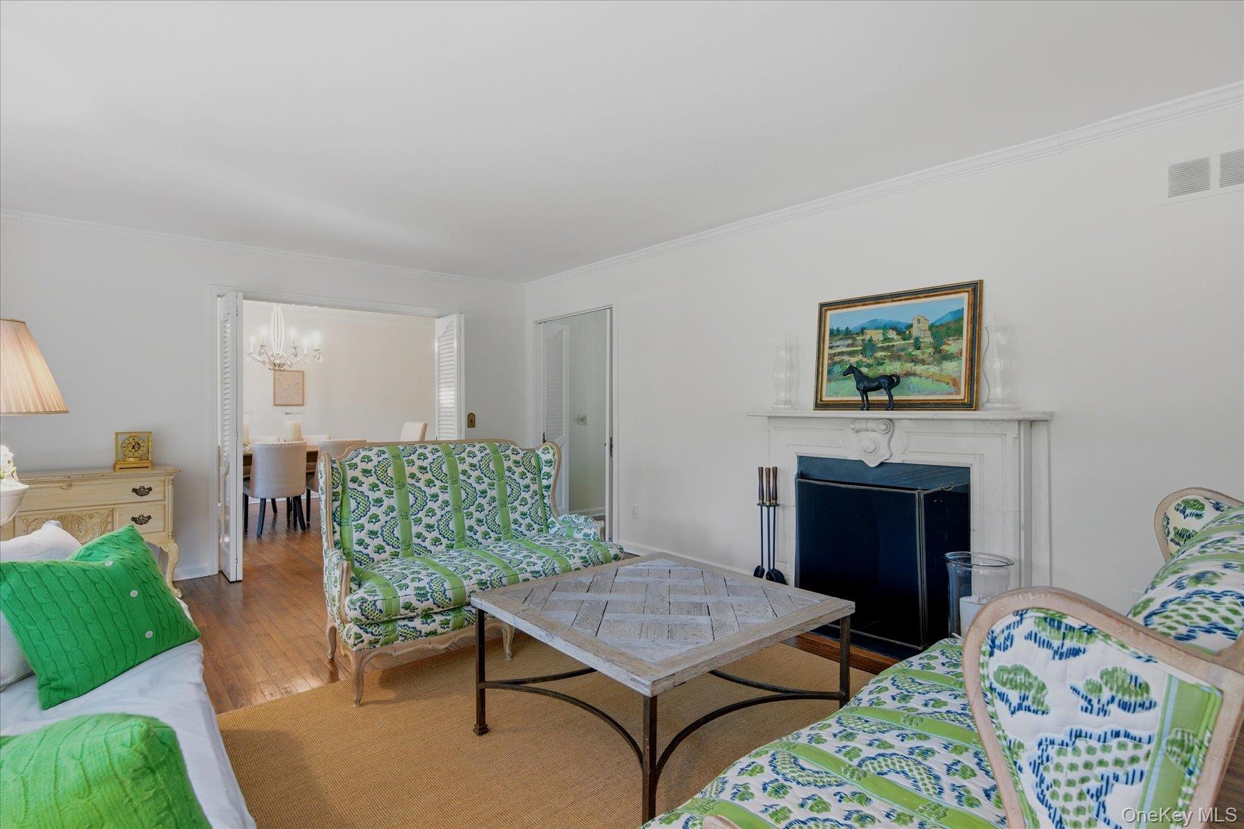 44 Georgica Close Road East Hampton, NY 11937 - Photo 15 of 28 a living room with furniture and a fireplace