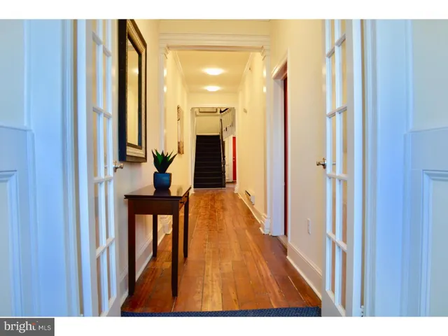 a view of a bathroom from the hallway