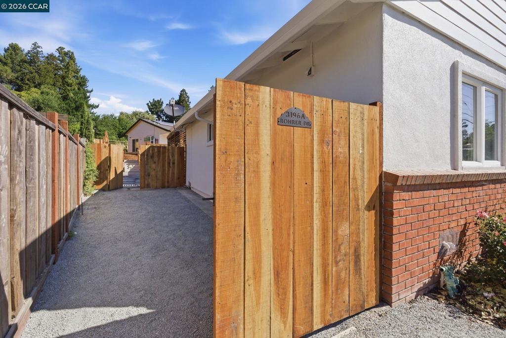 3196 Rohrer Drive Lafayette, CA 94549 - Photo 28 of 30 a view of a house with a backyard