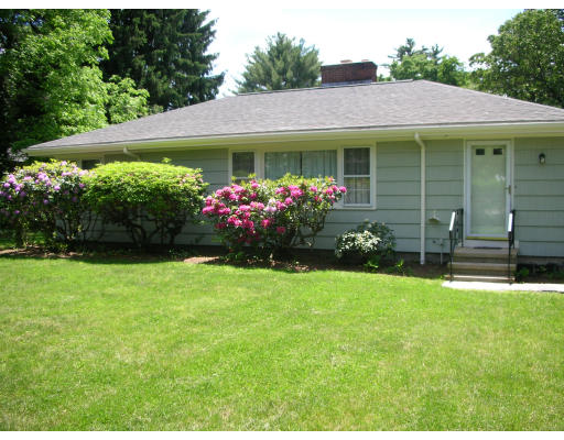 281 North Road Sudbury, MA 01776 - Photo 1 of 12 a view of a house with garden and yard