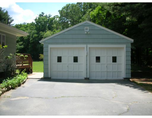 281 North Road Sudbury, MA 01776 - Photo 3 of 12 a front view of a house with a yard