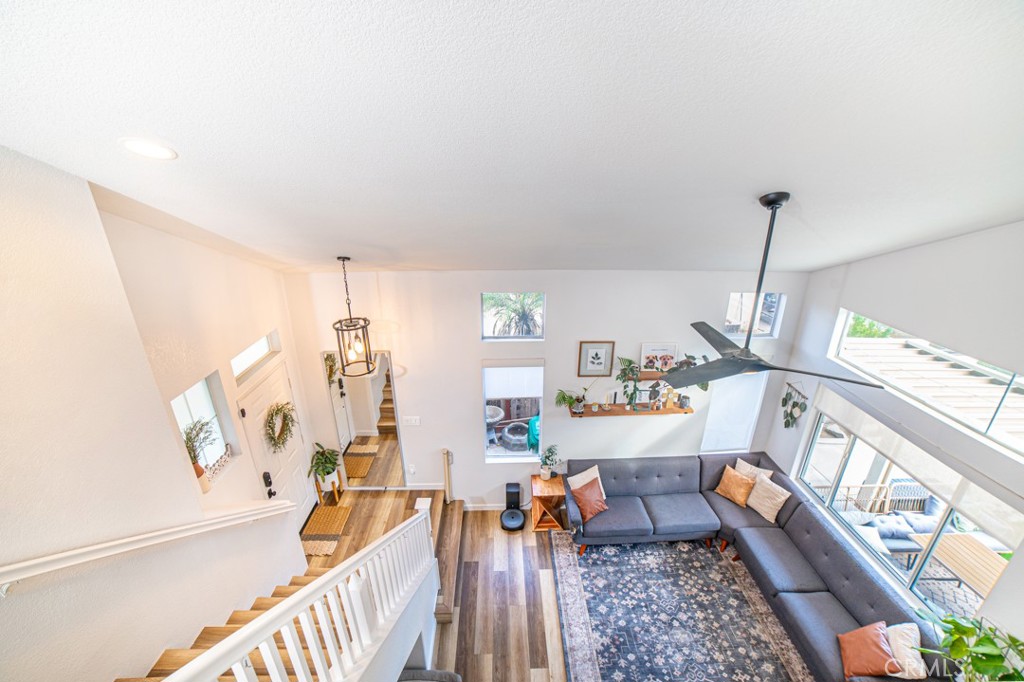 17801 Morning Rock Circle Riverside, CA 92503 - Photo 4 of 18 a living room with furniture and a chandelier