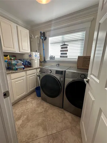 a bathroom with a granite countertop toilet a sink and mirror