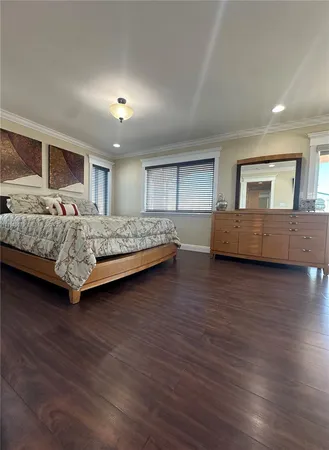 a bathroom with a glass door shower a sink and view