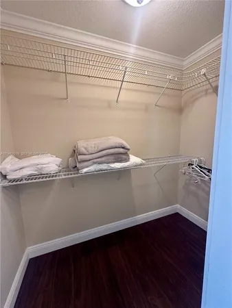 a view of a swimming pool and an outdoor seating