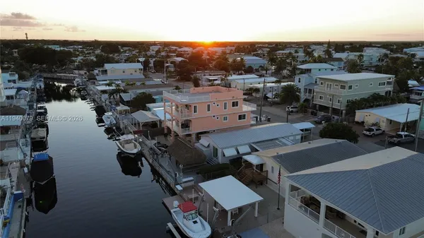 a bathroom with a sink and vanity