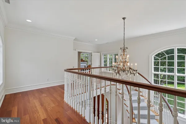 a view of a hallway with windows