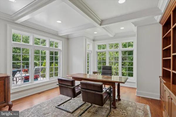 a workspace with furniture and a window