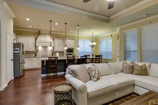 a view of kitchen with dining table and chairs
