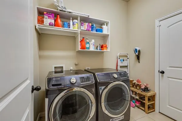 a view of washer and dryer in a utility room