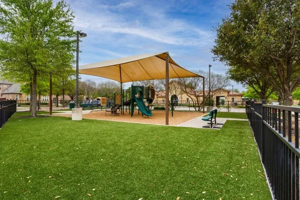 a view of a park with swings