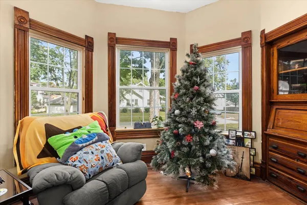a living room with furniture and a window