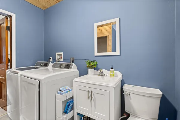 a utility room with dryer and washer