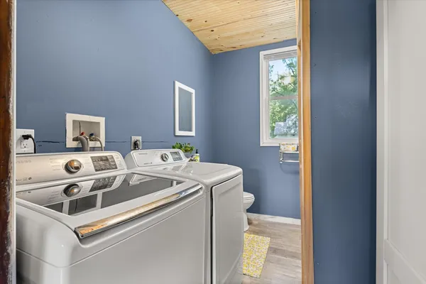 a utility room with dryer and washer