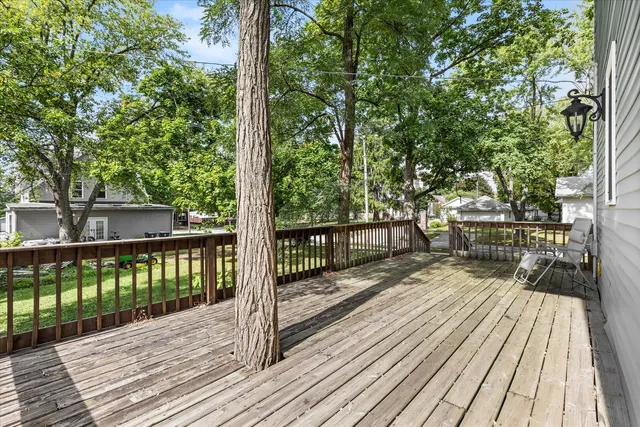 a view of a balcony with a tree