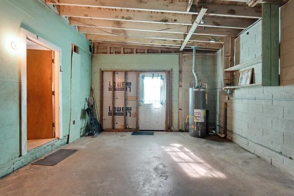 a view of a room with large windows