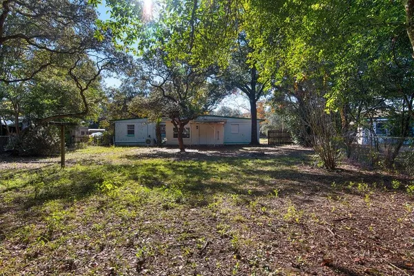 a house view with a outdoor space