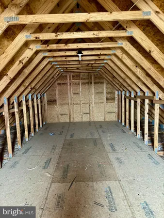 a view of a house with backyard porch and wooden floor