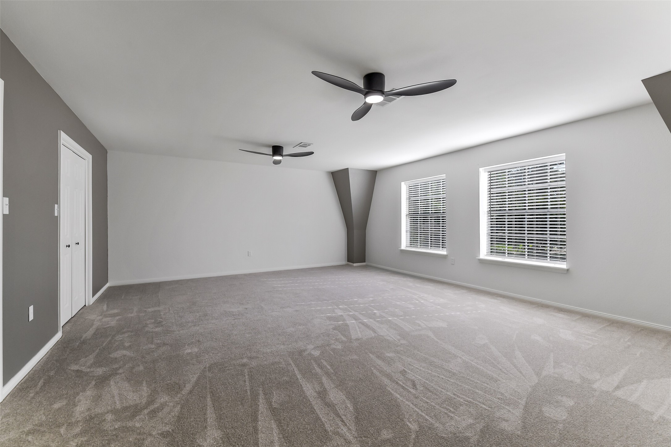 13103 Coral Ridge Court Houston, TX 77069 - Photo 21 of 43 a view of an empty room with a window