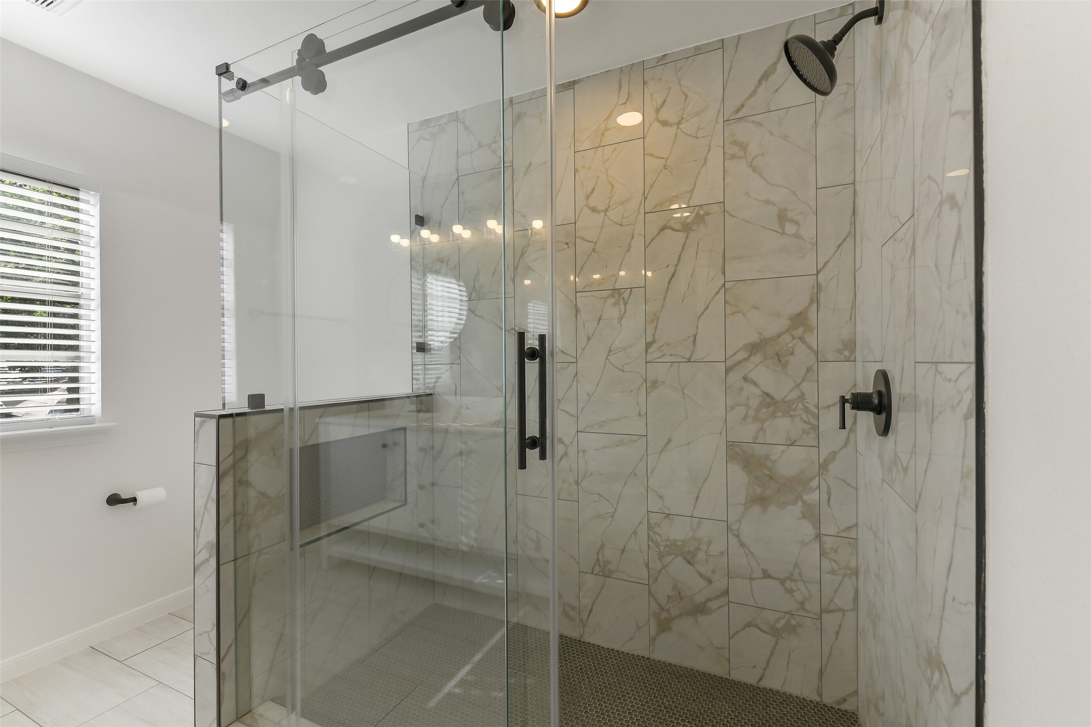 13103 Coral Ridge Court Houston, TX 77069 - Photo 23 of 43 a bathroom with a shower