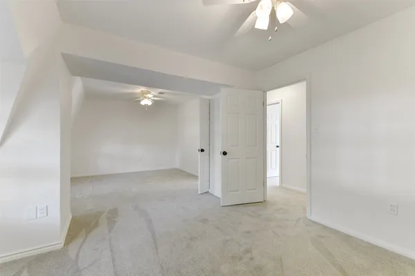 an empty room with a bathroom