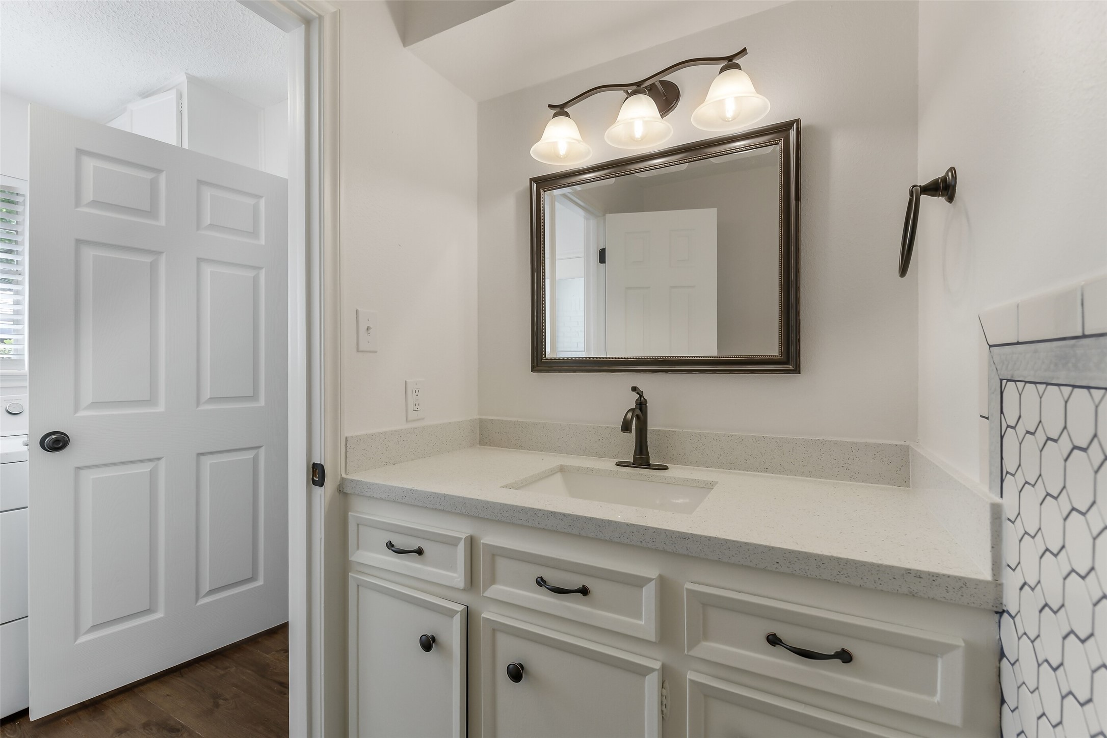 13103 Coral Ridge Court Houston, TX 77069 - Photo 32 of 43 a bathroom with a sink vanity and mirror