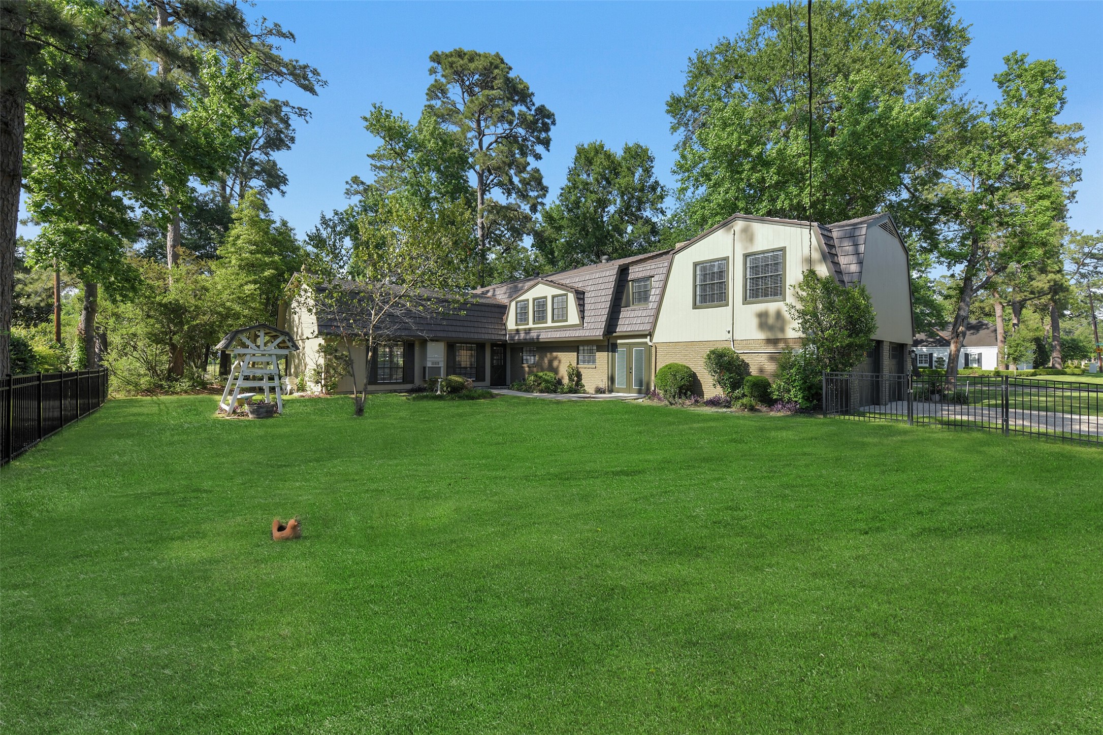 13103 Coral Ridge Court Houston, TX 77069 - Photo 33 of 43 a front view of a house with a yard and trees