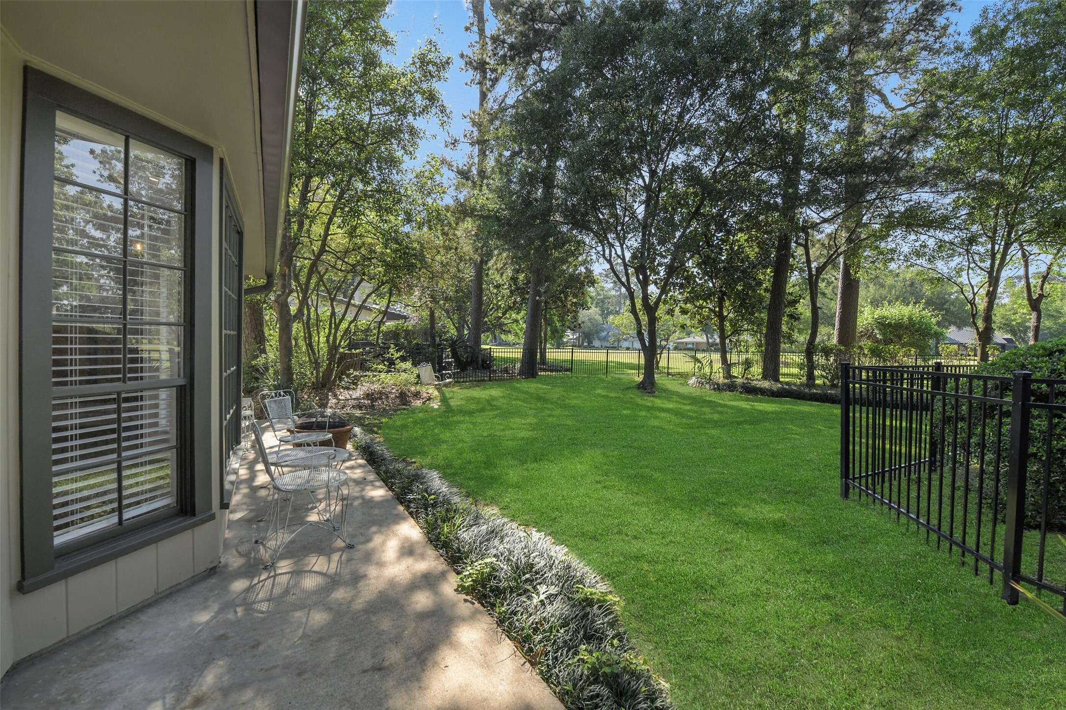 13103 Coral Ridge Court Houston, TX 77069 - Photo 34 of 43 a view of grassy field with trees