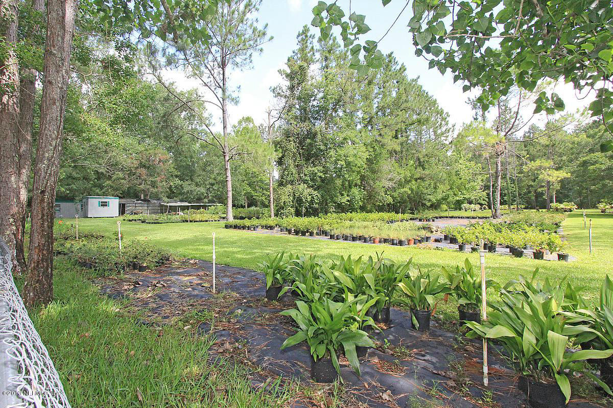 3098 I Pacetti Road St. Augustine, FL 32092 - Photo 11 of 21 a view of a garden with a slide