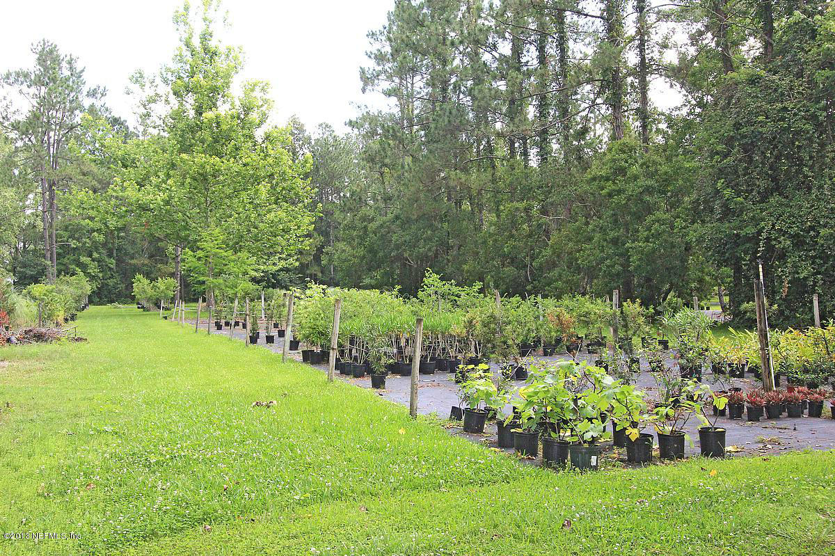 3098 I Pacetti Road St. Augustine, FL 32092 - Photo 13 of 21 a view of green field with sitting area