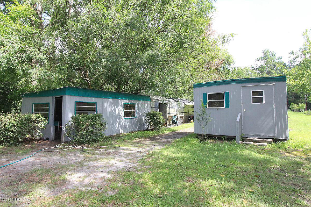 3098 I Pacetti Road St. Augustine, FL 32092 - Photo 14 of 21 a view of a house with backyard and garden
