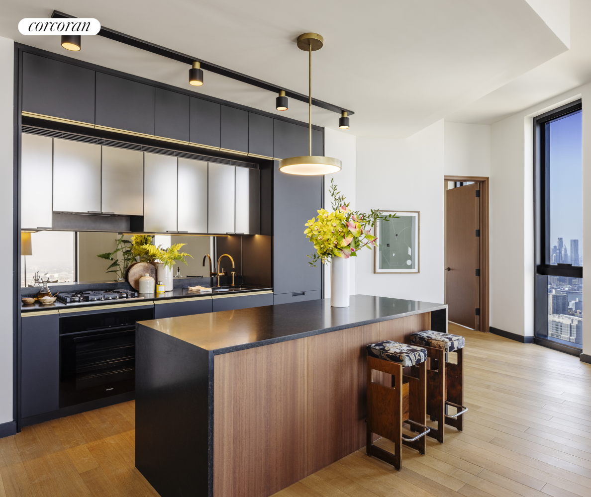 85 Fleet Street, Unit 75C Brooklyn, NY 11201 - Photo 3 of 32 a kitchen with sink refrigerator and window