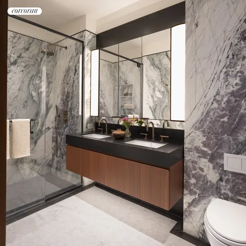 a bathroom with a sink a toilet and a shower curtain